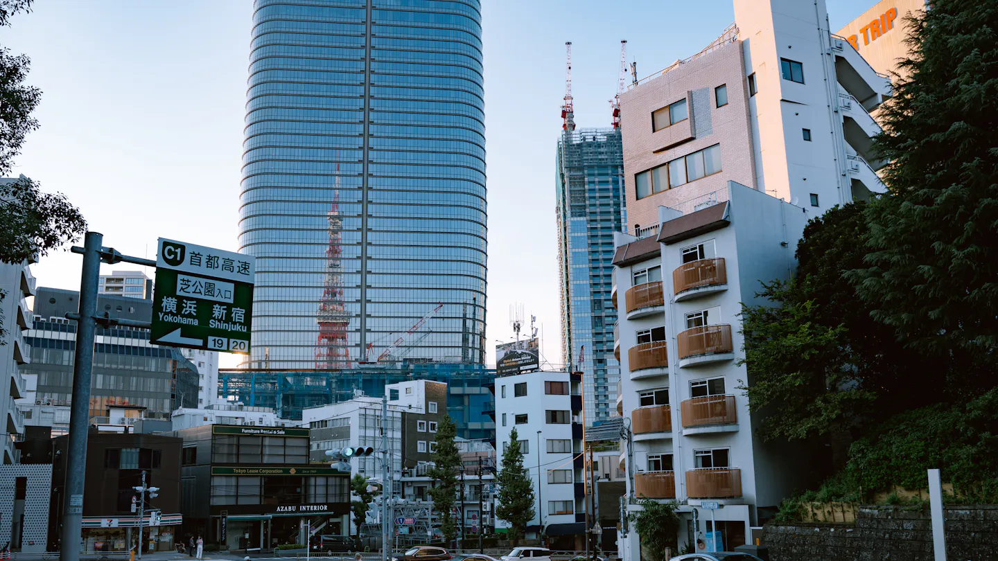 Japan's economy grows for a third quarter in a row but only half as fast as expected